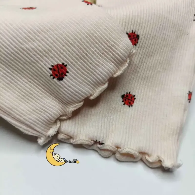 بلوز دخترانه کبریتی طرح کفشدوزک برند next