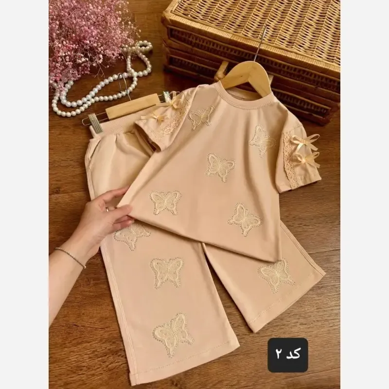 ست تیشرت و شلوار دخترانه پنبه دورس مناسب 3 تا 12 سال سایزبندی 35 تا 60